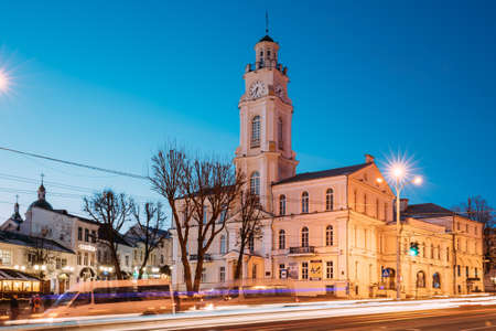 Vitebsk, Belarus - February 15, 2017: Traffic At Lenina Street And City Hall In Evening Or Night Illumination At Winter.のeditorial素材