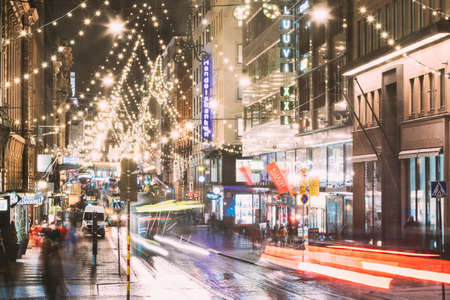 Helsinki, Finland - December 6, 2016: Night Evening Christmas Xmas New Year Festive Illumination On Aleksanterinkatu Street. Beautiful Street Decorations During Winter Holidays.のeditorial素材