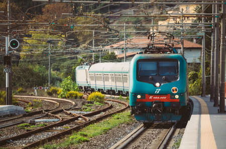 Monte San Biagio, Province of Latina, Italy - October 16, 2018: Suburban Electric Train Near Railway Station In Autumn Dayのeditorial素材