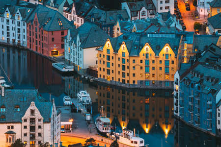 Alesund, Norway - June 21, 2019: Night View Of Alesund Skyline Cityscape. Historical Center In Summer Evening. Famous Norwegian Landmarks And Popular Destination.のeditorial素材