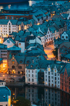 Alesund, Norway - June 21, 2019: Night View Of Alesund Skyline Cityscape. Historical Center In Summer Evening. Famous Norwegian Landmarks And Popular Destination.のeditorial素材