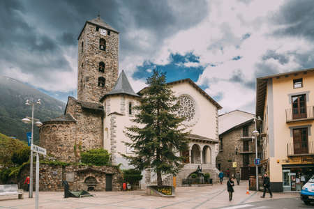 Andorra La Vella, Andorra - May 15, 2018: People Walking On Prince Benlloch Square Near Famous Church Of Saint Esteve. Esglesia De Sant Esteve Located On Placa Del Princep Benlloch. Cultural Heritageのeditorial素材
