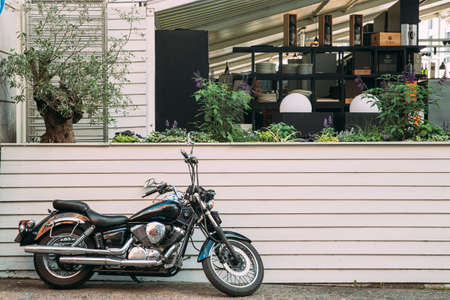 Yamaha, Motorbike, Motorcycle Cruiser Parked Near Summer Cafeのeditorial素材