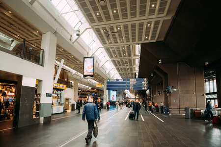 Oslo, Norway - June 12, 2019: People Visiting Oslo Central Station Railway Station.のeditorial素材