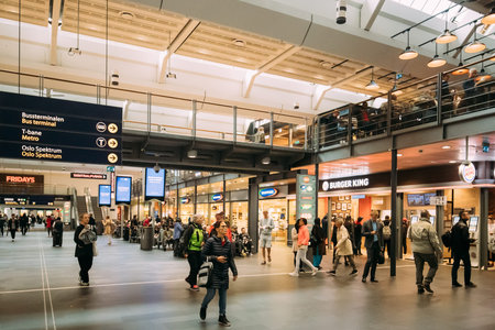 Oslo, Norway - June 12, 2019: People Visiting Oslo Central Station Railway Station.