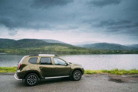 Kroderen, Norway - June 12, 2019: Car Renault Duster SUV Parked Near Lake Kroderen In Norwegian...