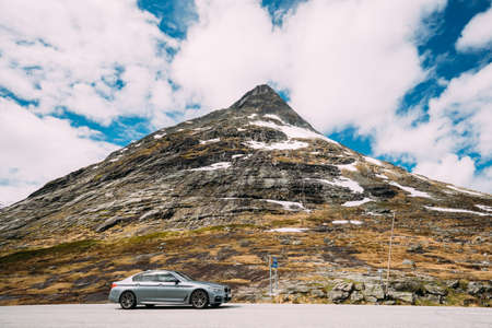 Reinheimen National Park, Norway. Gray BMW 520d Sedan M Sport on mountains road.Reinheimen National Park, Norway.のeditorial素材