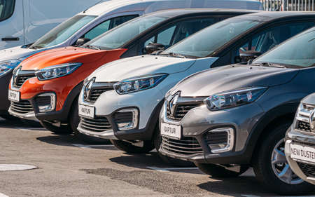 Different Renault Cars parking in row outdoors. Subcompact Crossovers Produced Jointly By RenaultâNissan Alliance.のeditorial素材