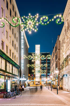 Helsinki, Finland - December 6, 2016: New Year Lights Xmas Christmas Decorations And Festive Illumination In Kluuvikatu Street. Winter Christmas Xmas Holiday Seasonのeditorial素材
