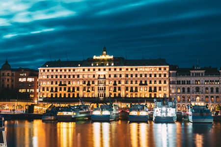 Stockholm, Sweden. Grand Hotel Located On The Peninsula Blasieholmen In Summer Night.のeditorial素材