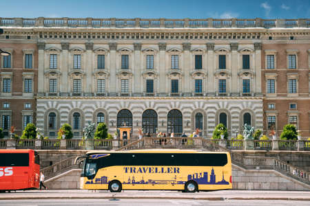 Stockholm, Sweden. Yellow Touristic Bus For Sightseeing Parking Near Near Stockholm Royal Palace. Famous World Unesco Landmark. City Tour Bus.のeditorial素材
