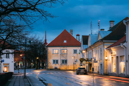 Kuressaare, Estonia. Building Of Noble Assembly And Kuressaare Town Hall At Lossi Street In Evening Or Night Illuminationsのeditorial素材