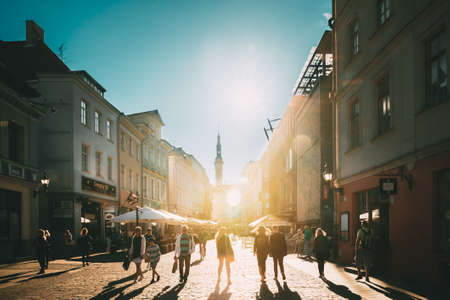 Tallinn, Estonia. People Walking In Viru Street In Sunny Summer Evening. Famous Old Street To Town Hall Square.のeditorial素材