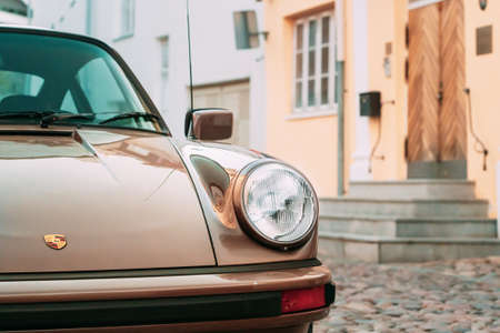 Close Front View Of Porsche 930 Car Parked In Old Narrow Street.のeditorial素材