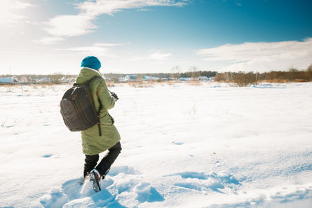 Young Woman Tourist Lady Photograph Taking Pictures Of Snowy Landscape In Sunny Winter Day. Active...