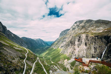 Trollstigen, Andalsnes, Norway. People Tourists Visiting Viewing Platform Near Visitor Centre. Famous Norwegian Landmark And Popular Destination. Norwegian County Road 63のeditorial素材