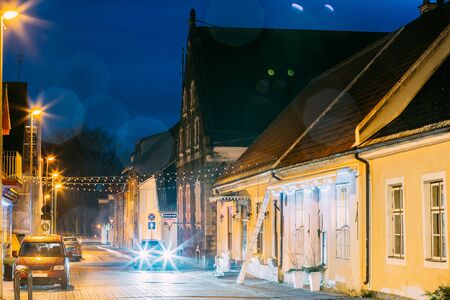 Parnu, Estonia. Night View Of Puhavaimu Street With Old Buildings, Restaurants, Cafe, Hotels And Shops In Evening Night Illuminations.の写真素材