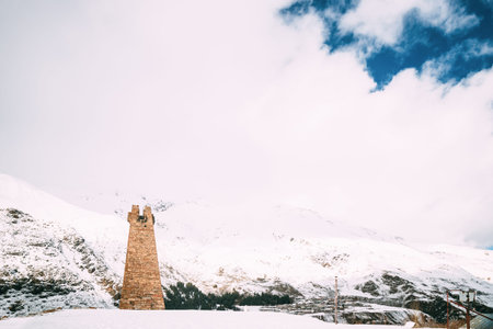 Sioni, Mtskheta-Mtianeti Region, Georgia. Ancient Old Stone Watchtower On Mountain Village. Winter...