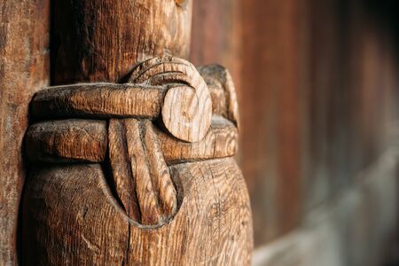Borgund, Norway. Carved Details Of Famous Wooden Norwegian Landmark Stavkirke. Ancient Old Wooden Triple Nave Stave Church. Close View, Details.の写真素材