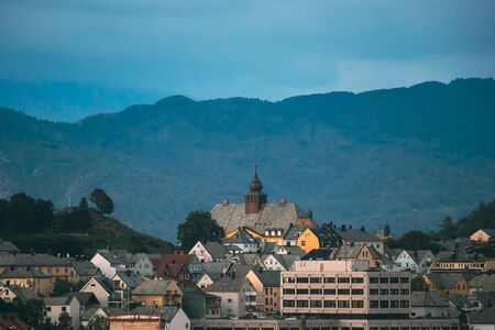 Alesund, Norway. Alesund Skyline Cityscape. Historical Center In Summer Evening. Old Aspoy School. Aspoya Islandの写真素材