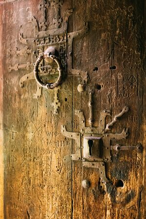 Borgund, Norway. Carved Details Of Famous Wooden Norwegian Landmark Stavkirke. Ancient Old Wooden Triple Nave Stave Church. Close View, Door Details.の写真素材