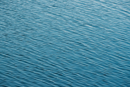 Calm Water Ripple Surface Natural Blue Background.