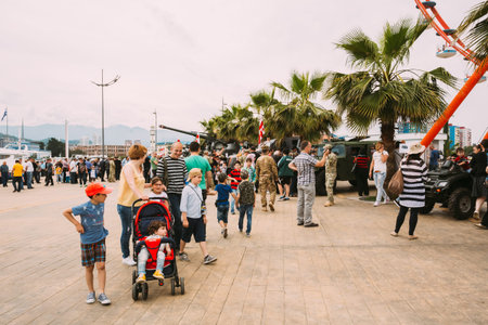 Batumi, Adjara, Georgia - May 26, 2016: People walking and taking photo at celebration Of The National Holiday - The Independence Day Of Georgia.のeditorial素材