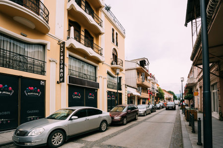 Batumi, Adjara, Georgia - May 26, 2016: Street With Row Of Parked Cars Along The Pavement In Summer...