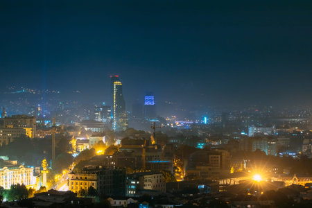Tbilisi, Georgia - October 21, 2016: Evening Night Scenic View Of Skyscraper. Street Night...