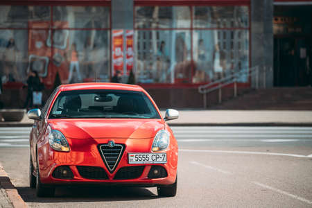 Minsk, Belarus - April 7, 2017: Red Alfa Romeo Giulietta Car In City Street.のeditorial素材