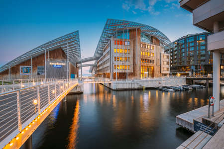 Oslo, Norway - June 23, 2019: Astrup Fearnley Museum of Modern Art, Residential Multi-storey Houses In Aker Brygge District In Summer Evening. Famous And Popular Place.のeditorial素材