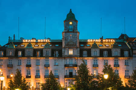 Oslo, Norway - June 24, 2019: Building Of Grand Hotel Oslo In Night View. Centrum District In Summer Evening.のeditorial素材