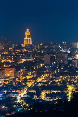 Batumi, Adjara, Georgia - May 27, 2016: Aerial View Of Urban Cityscape At Evening Or Night. Sheraton Batumi Hotel In Night Illuminationのeditorial素材