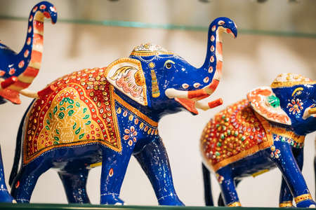 Goa, India. Painted Elephant Souvenir Of Porcelain On Shelf In Store. Goods For Tourists.のeditorial素材