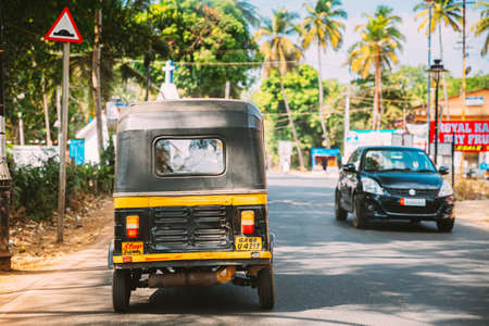 Goa, India - February 12, 2020: Auto Rickshaw Or Tuk-tuk Moving On Street. Back Viewのeditorial素材
