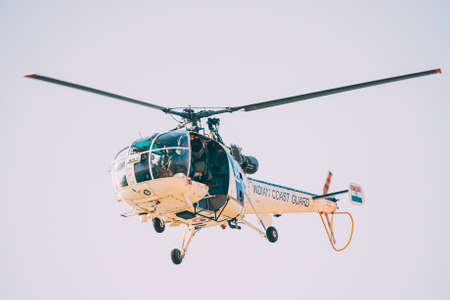 Goa, India - February 18, 2020: Helicopter Of Indian Coast Guard Patroling Situationのeditorial素材
