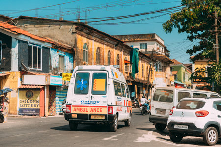 Mapusa, Goa, India - February 19, 2020: Ambulance Car Moving With Siren Emergency Ambulance...
