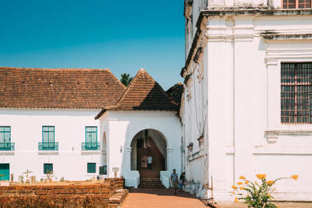 Old Goa, India - February 19, 2020: People Walking Near Archaeological Museum of Goaのeditorial素材