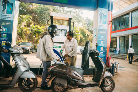 Goa, India - February 14, 2020: Scooters Are Refueling At Hp Petrol Pumpのeditorial素材