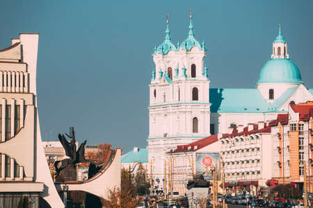Grodno, Belarus - October 16, 2019: Grodno Regional Drama Theatre And St. Francis Xavier Cathedral In Summer Sunny Day.のeditorial素材