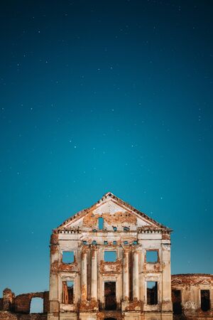 Ruzhany, Brest Region, Belarus. Night Starry Sky Above Ruzhany Palace. Famous Popular Historic Landmark Under Night Stars. Night View. Close Upの写真素材