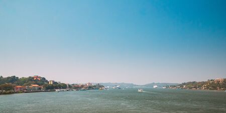 Panaji, Goa, India. Water Navigation On The Mandovi River. Ships Floating On River.の写真素材