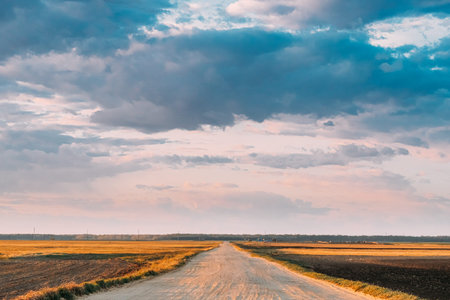 Evening Sky Above Rural Landscape With Country Road Through Spring Soil Field Pathway, Way, Open...