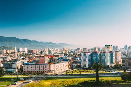 Batumi, Georgia. Cityscape Of Georgian Resort Town Of Batumi. Different Colored Houses At Sunset Evening Time. Urban Architecture In Batumi, Adjara Georgia. Sunny Clear Blue Skyの写真素材