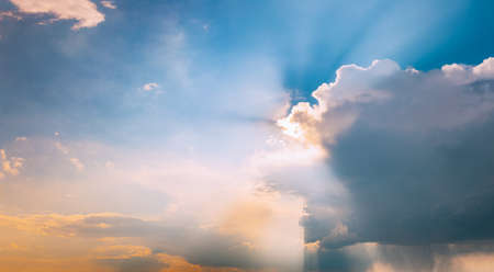 Sunshine In Sunrise Bright Dramatic Sky During Rain. Scenic Colorful Sky At Dawn. Sunset Sky Natural Abstractの写真素材