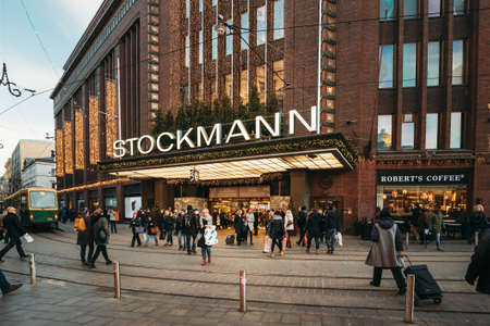 Helsinki, Finland. People Walking Near Stockmann Department Store On Aleksanterinkatu Street In Christmas Xmas New Year Festive Decorations. It Is Finnish Company Of Retail Tradeのeditorial素材
