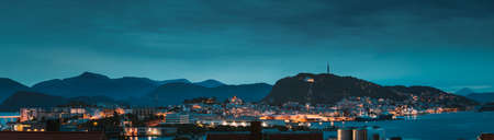 Alesund, Norway. Night Alesund Skyline Cityscape. Historical Center In Summer Evening. Famous Norwegian Landmark And Popular Destination. Alesund, Kiven viewpoint, Mt. Panorama Panoramic View.の写真素材
