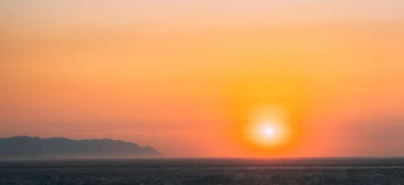 Aegean Sea. Evening Sun Sunshine Above Sea. Natural Sunset Sky Warm Colors. Panorama, Panoramic View Seascapeの写真素材