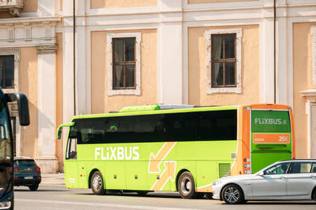 Bus Of Flixbus Moving On Street. Flixbus Is Brand Which Offers International Bus Service All Over Europe.のeditorial素材