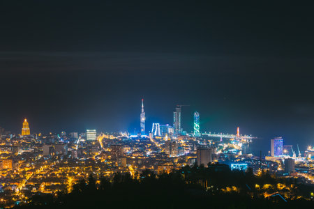 Batumi, Adjara, Georgia. Aerial View Of Urban Cityscape At Sunset. Black Sea Technological University, Radisson Blu Hotel, Residential House Porta Batumi Tower And Alphabet Towerのeditorial素材
